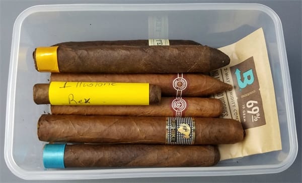A step-by-step way of keeping cigars fresh using a homemade tupperware humidor